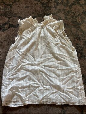 Women’s  Cream Ruffle-Neck Sleeveless blouse